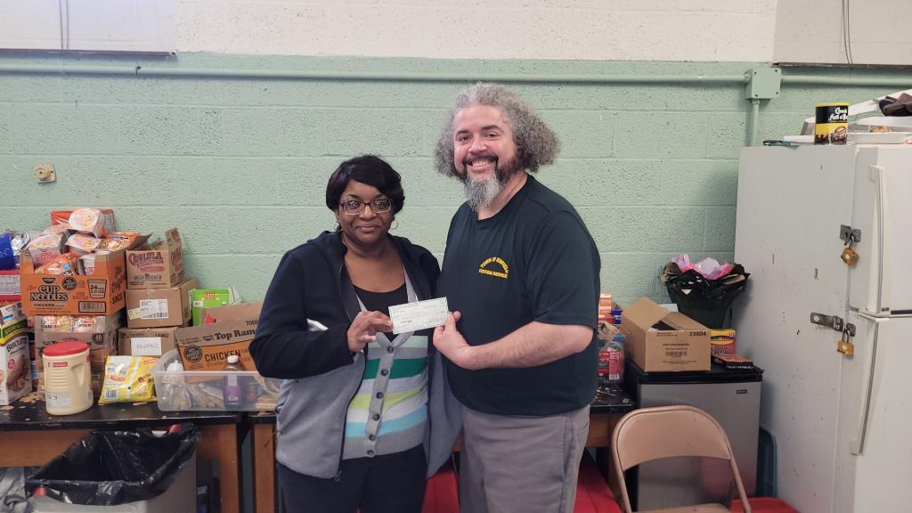 AFSCME Local 1029 President Felix Ruiz Jr pictured with Enfield Safe Harbor Warming Center Director Monica Wright.