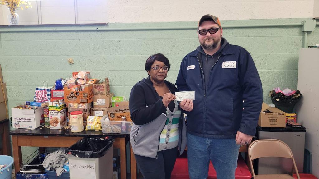 AFSCME Local 1029 Vice President Chris Hulevitch pictured with Enfield Safe Harbor Warming Center Director Monica Wright.